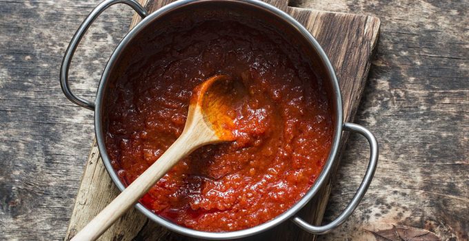 Classic homemade savory sauce in the pan for pizza or meatloaf